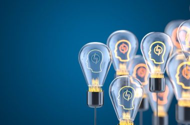 Image with multiple lightbulbs symbolizing thought leadership as providing value to your audience through your expertise, not about standing out from the crowd. 